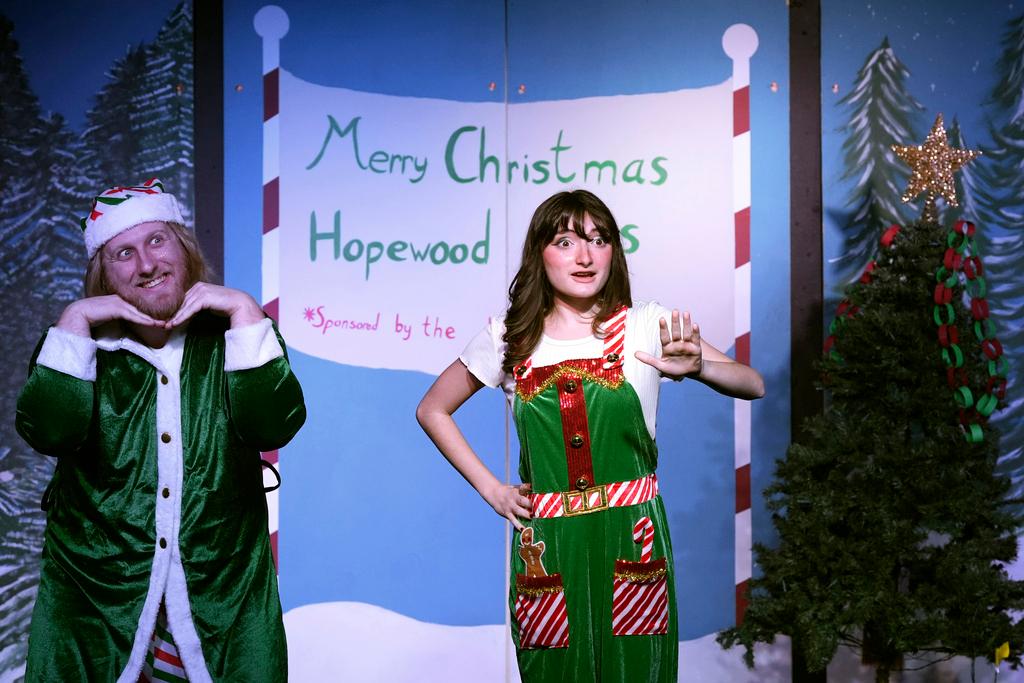 Narrators Kayla Patnod, right, and William Buckley introduce a scene during a dress rehearsal for the production of "The Holiday Channel Christmas Movie Wonderthon"