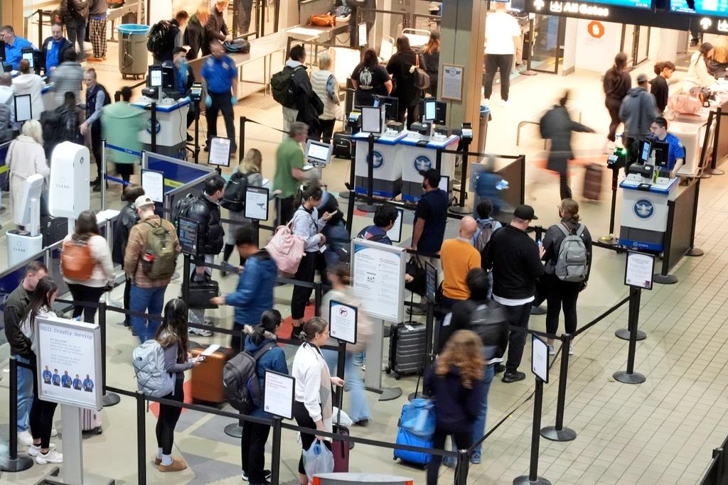 Passengers line up at the security checkpoint in Pittsburgh International Airport Dec. 11, 2024.