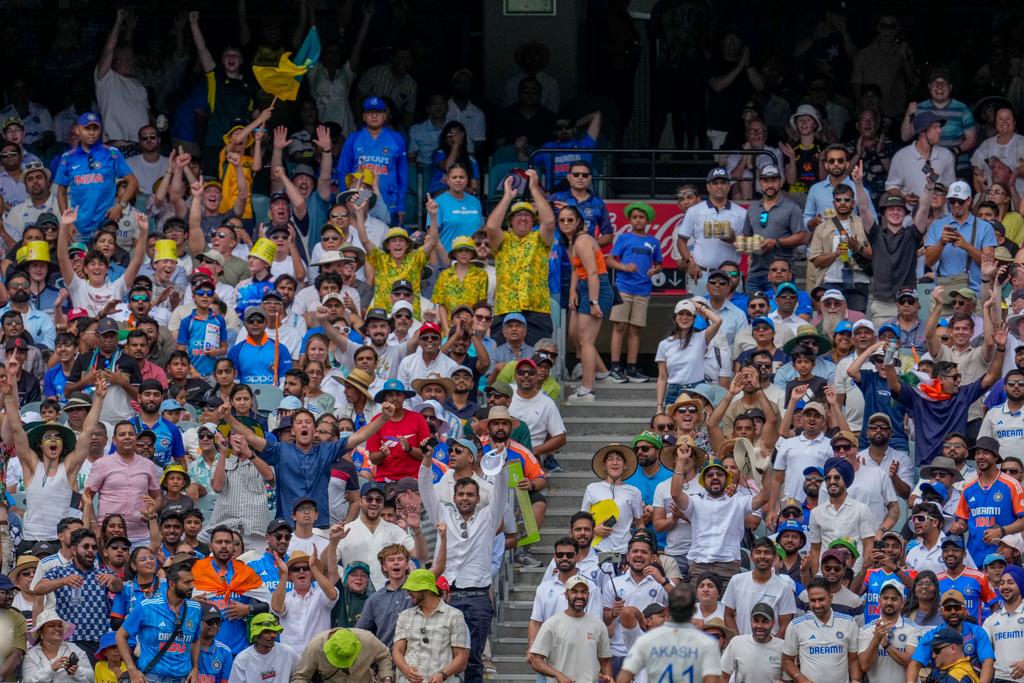 FILE - The crowd reacts after Australia's Sam Konstas hits a six during play on the first day of the fourth cricket test between Australia and India at the Melbourne Cricket Ground, Melbourne, Australia, Thursday, Dec. 26, 2024.