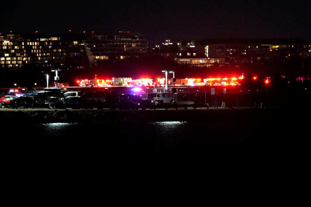 A view of emergency response looking from Arlington, Va., south of Ronald Reagan Washington National Airport, across the Potomac River toward the District of Columbia, Wednesday, Jan. 29, 2025. 