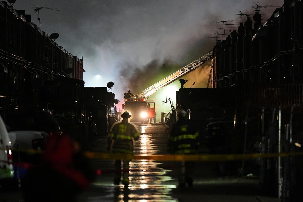 First responders work the scene after a small plane crashed in Philadelphia