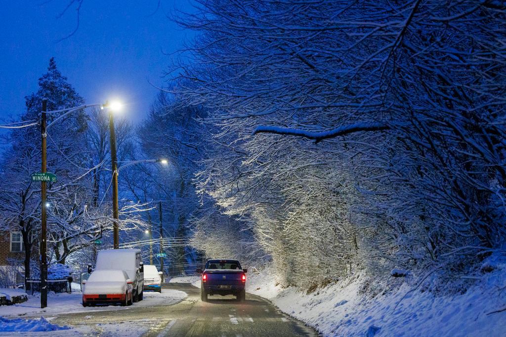 Snow falls along Gypsy Lane in the East Falls section of Philadelphia
