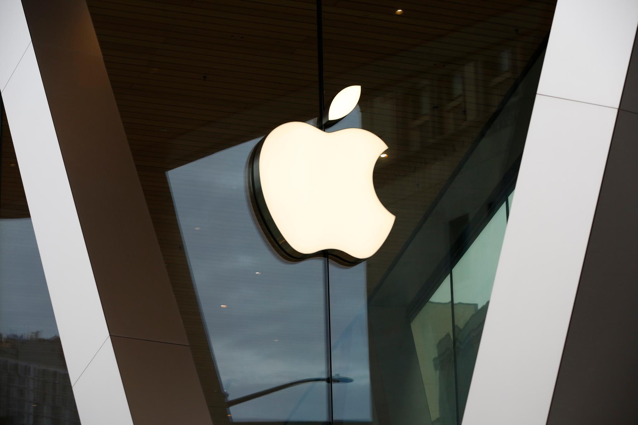 An apple logo outside of a store