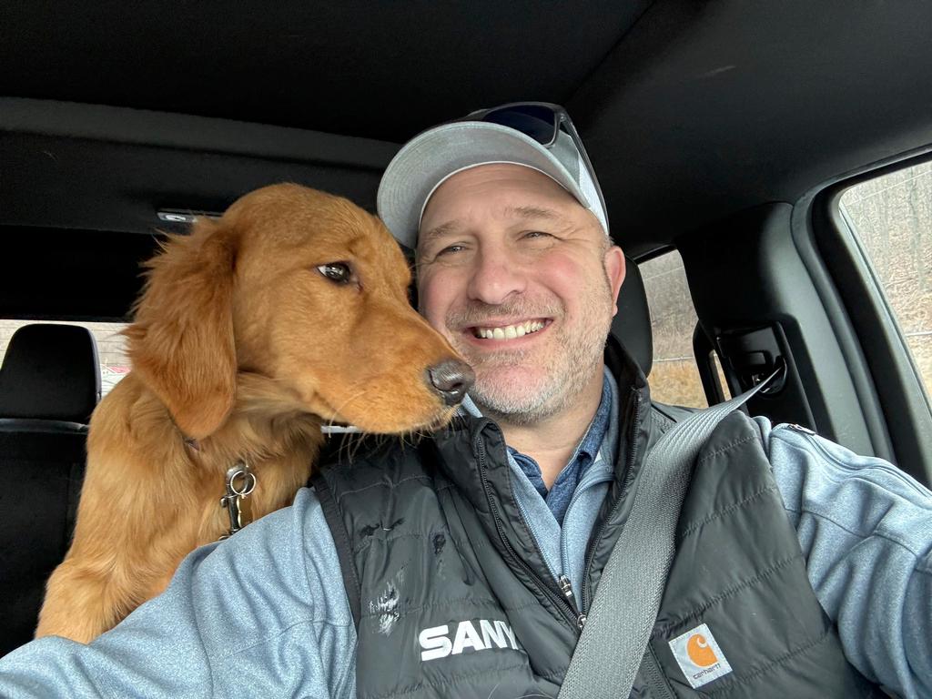 Joe Palko after he was reunited with his six-month-old Golden retriever pup named Freddy, a week after the dog ran off from his home at the base of Sharp Mountain in Pottsville, Pa.
