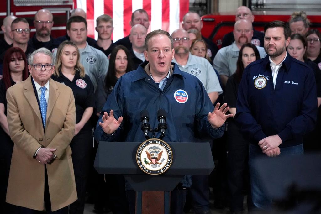  Vice President JD Vance, right, and Ohio Gov. Mike DeWine, left, listen as Environmental Protection Agency administrator Lee Zeldin, center, speaks 