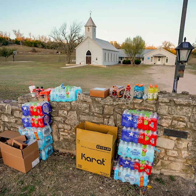 Supplies are set up in front of Gillespie County's St. Paul's Lutheran Cave Creek Church for first responders of the Crabapple Fire in Fredericksburg, Texas