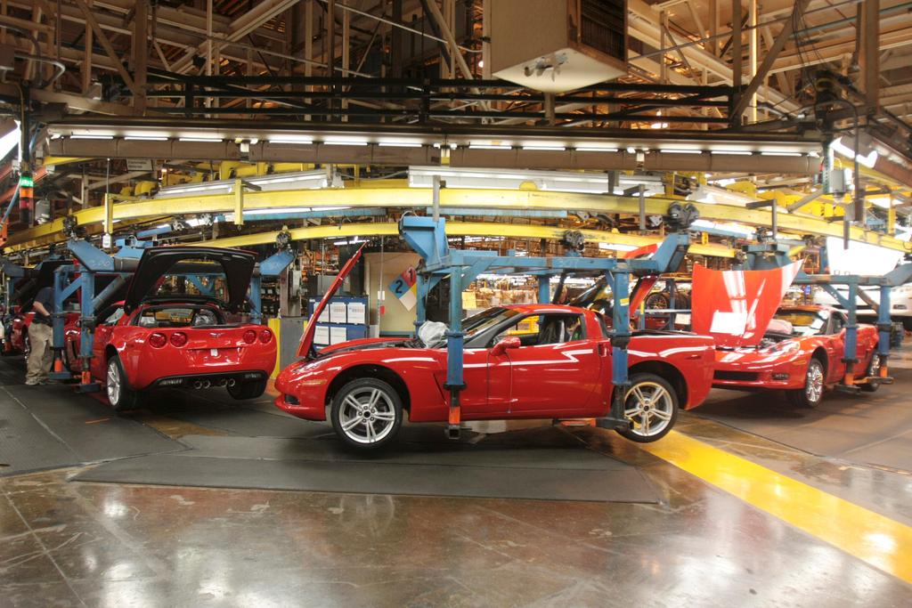  A line of red Corvettes pass through the GM's Bowling Green Assembly Plant 