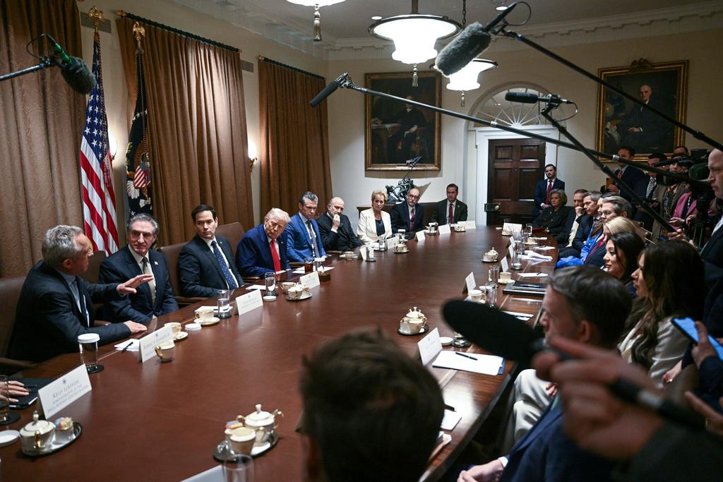 Health and Human Services Secretary Robert F. Kennedy Jr., from left, speaks as Interior Secretary Doug Burgum, Secretary of State Marco Rubio, President Donald Trump, Defense Secretary Pete Hegseth, Commerce Secretary Howard Lutnick Secretary of Education Linda McMahon, Director of the Office of Management and Budget Russell Vought and White House National Security Adviser Mike Waltz listen during a cabinet meeting in the Cabinet Room of the White House,