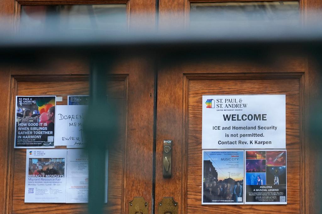 A sign that prohibits the entrance of ICE or Homeland Security is posted on a door at St. Paul and St. Andrew United Methodist Church in New York
