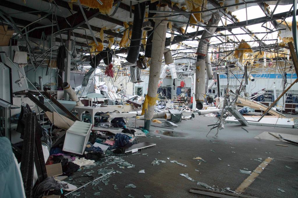 Damage to Maurice's clothing is shown in Ada, Okla., after severe weather 