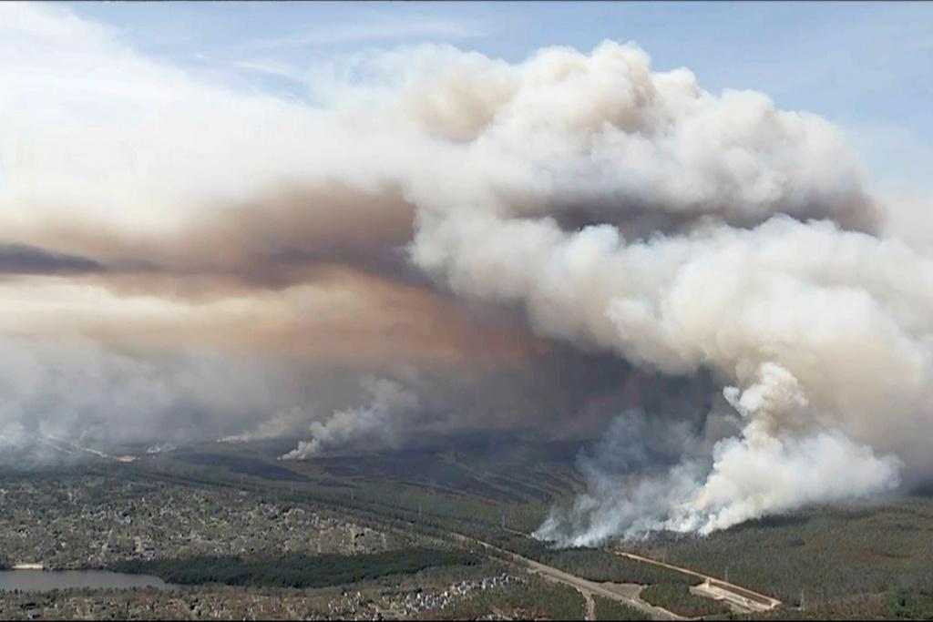 Image taken from aerial video shows smoke rising from wildfires in Ocean County, N.J.