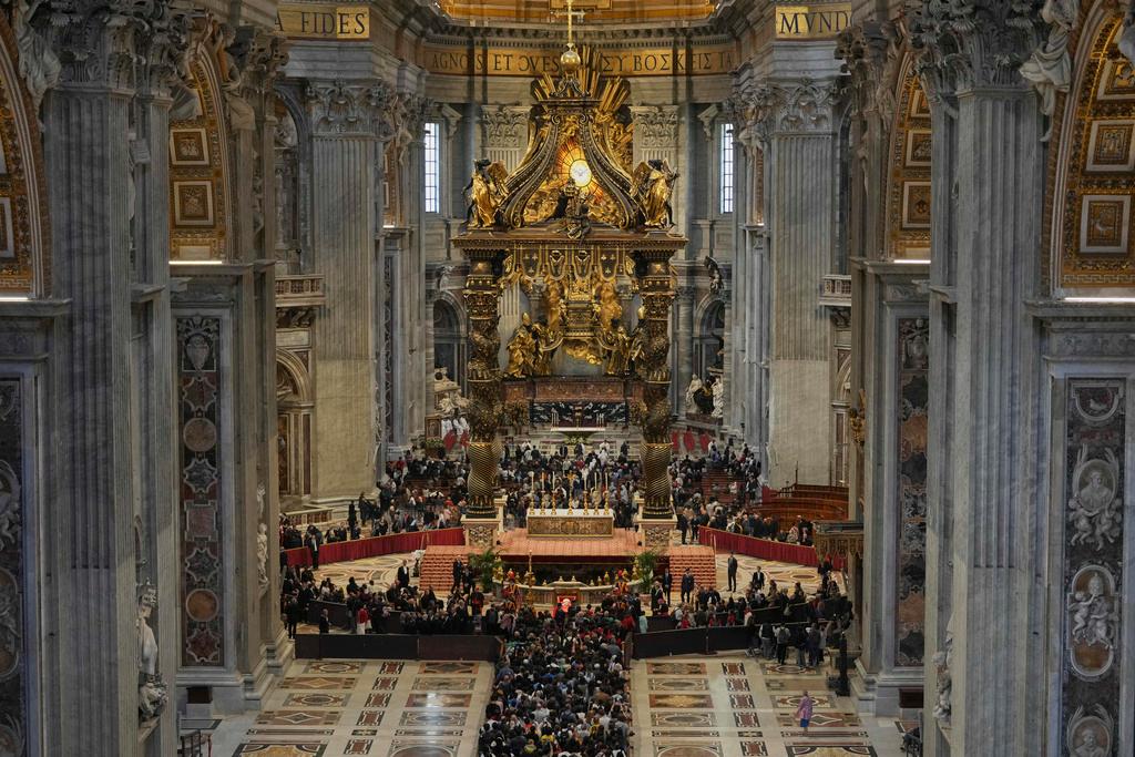 People line up to pay their respects to Pope Francis lying in state, inside St. Peter's Basilica, at the Vatican
