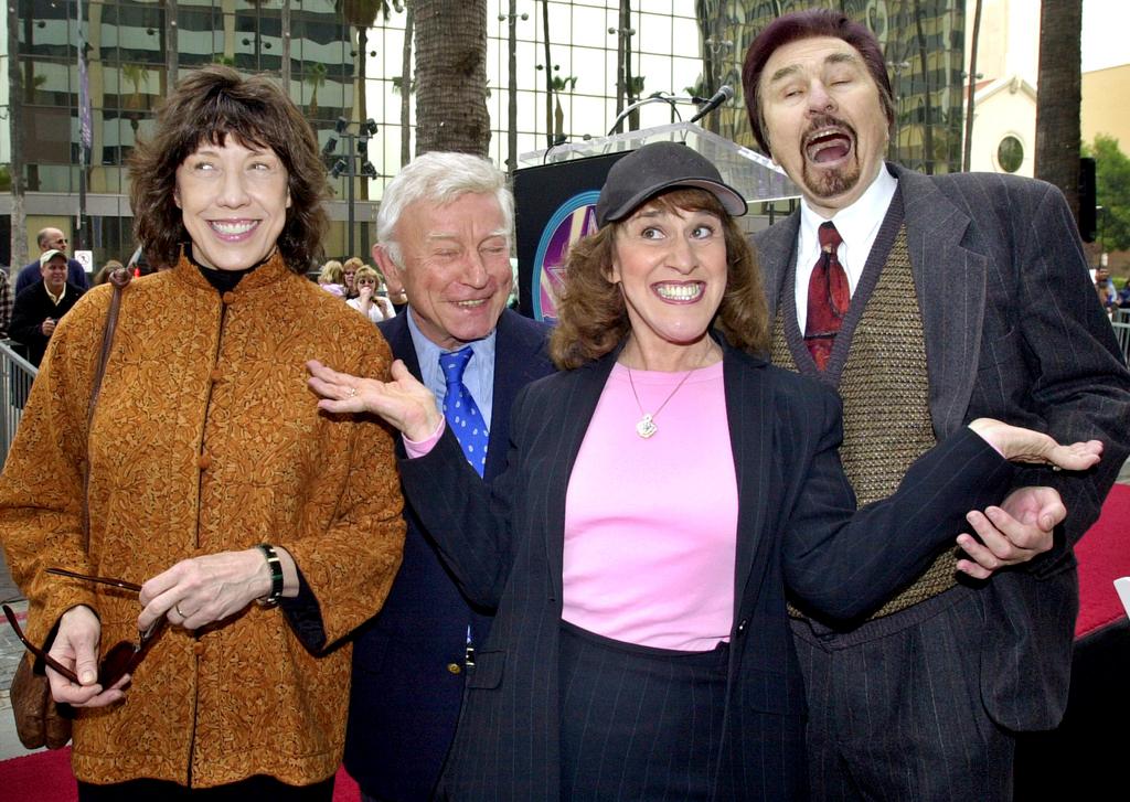 "Rowan & Martin's Laugh-In" cast members, from left, Lily Tomlin, Henry Gibson, Ruth Buzzi and Gary Owens pose for the media in 2002, in Hollywood 