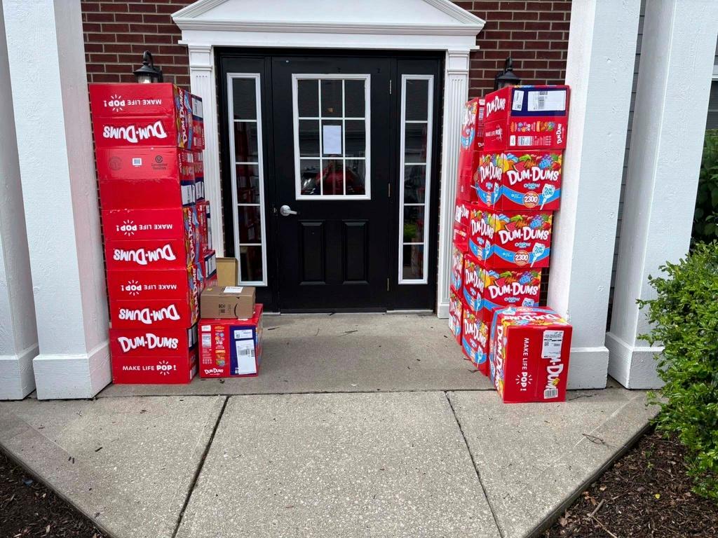 Boxes of Dum-Dum lollipops outside of Holly LaFavers's home 