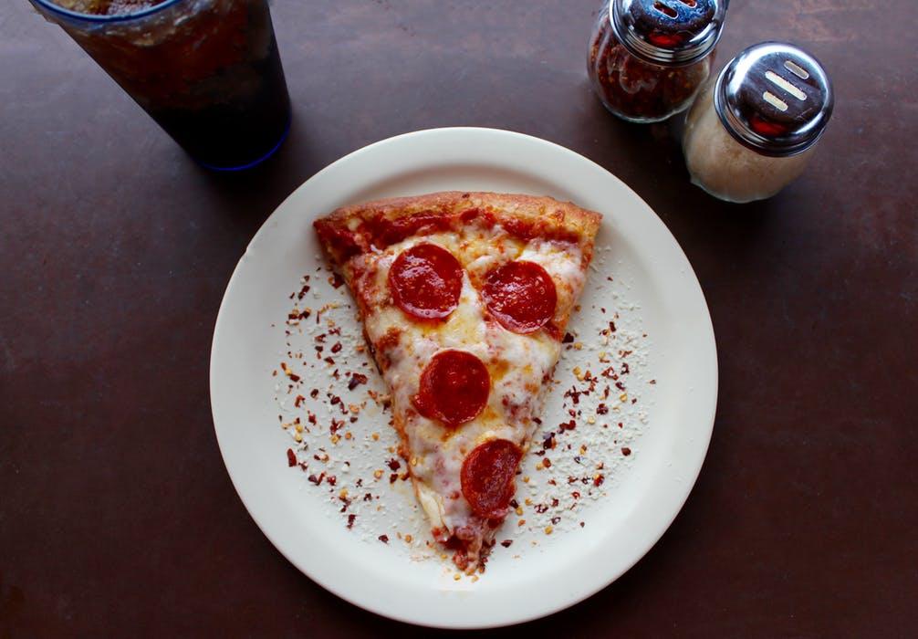 Slice of pizza on a plate