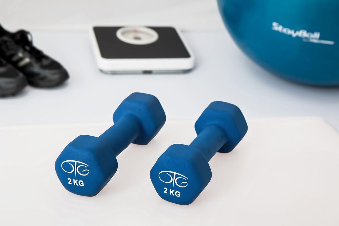 2 kg 1 pair dumbbell near weight scale