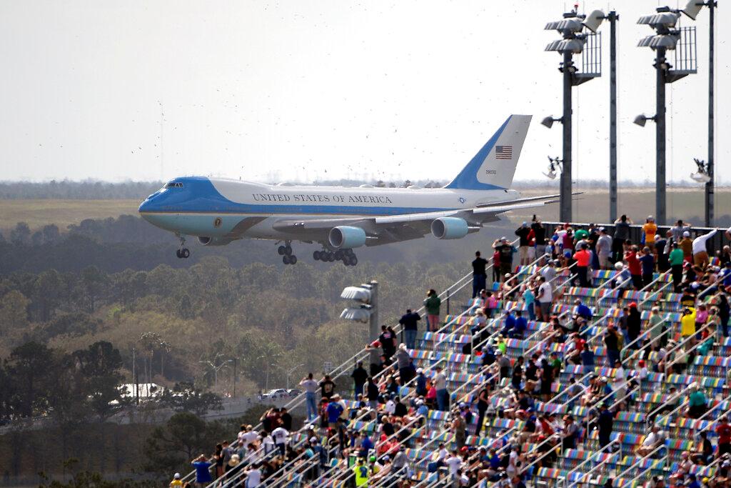 Air Force One, carrying President Donald Trump, prepares to land at Daytona International Airport