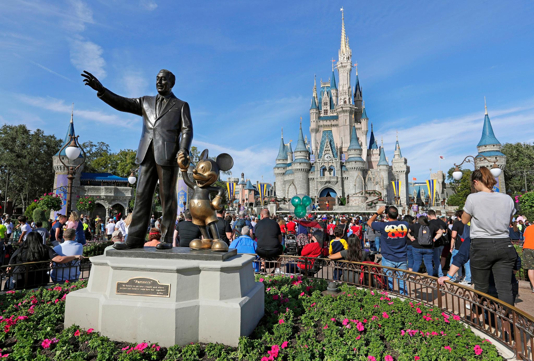  Walt Disney and Micky Mouse in front of the Cinderella Castle at the Magic Kingdom at Walt Disney World