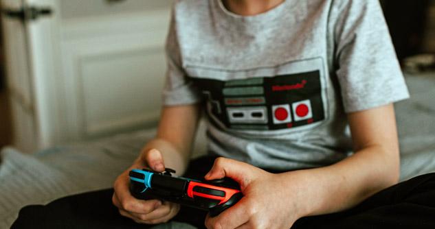 boy holding video game controller