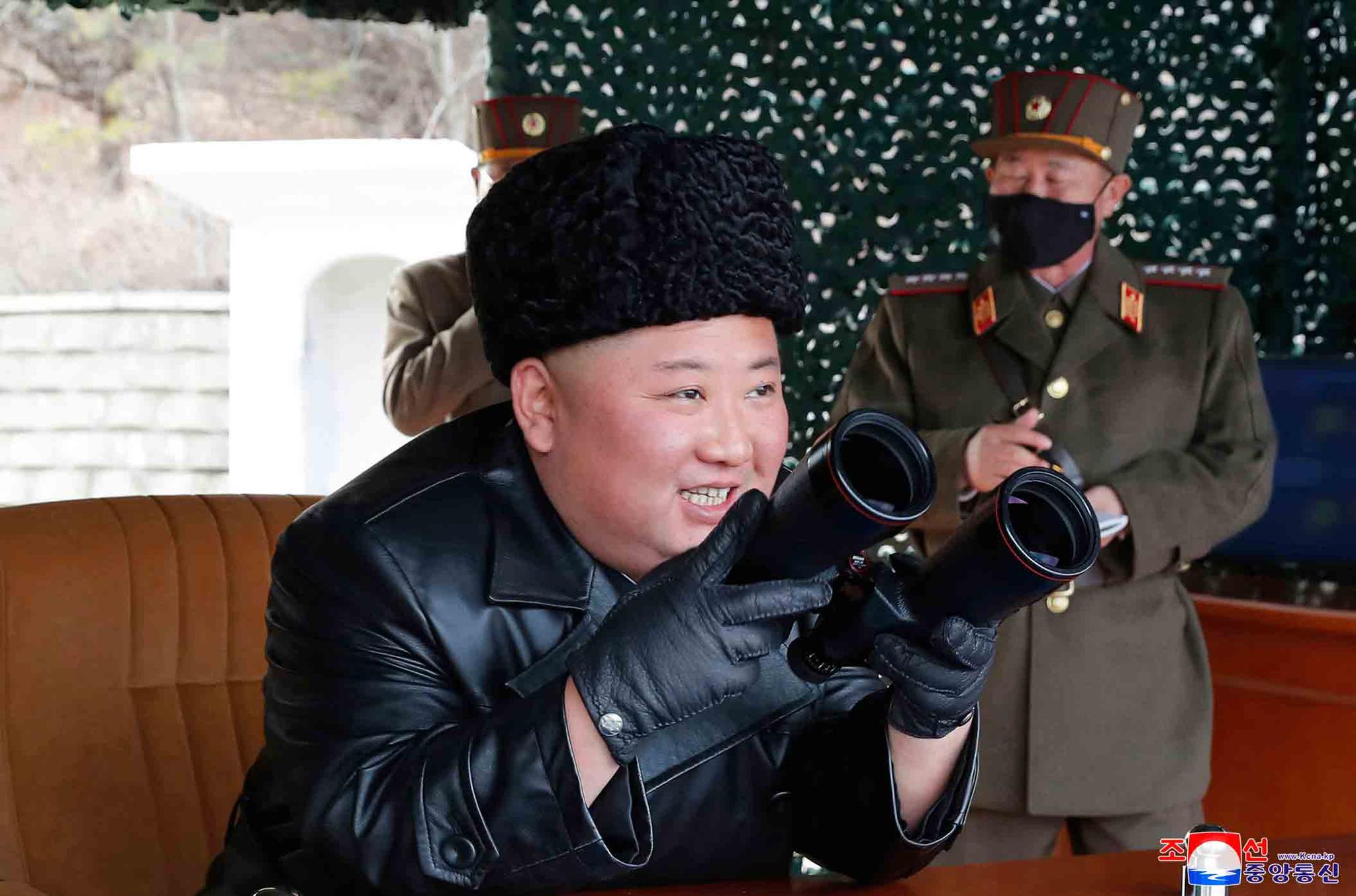 In this photo provided by the North Korean government, North Korean leader Kim Jong Un inspects a military drill at undisclosed location in North Korea