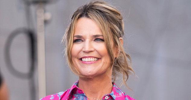Savannah Guthrie wearing a pink flowered dress, smiling
