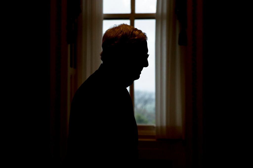 Senate Majority Leader Mitch McConnell of Ky. walks to the Senate Chamber on Capitol Hill