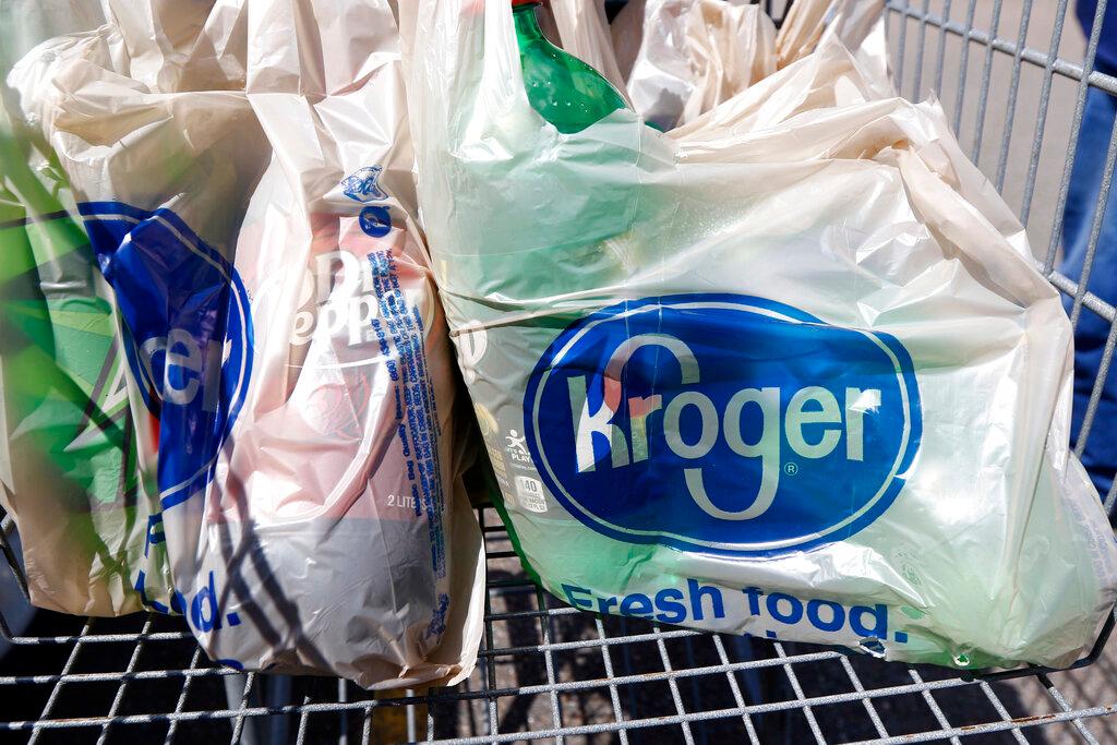 Kroger grocery bags in shopping cart 