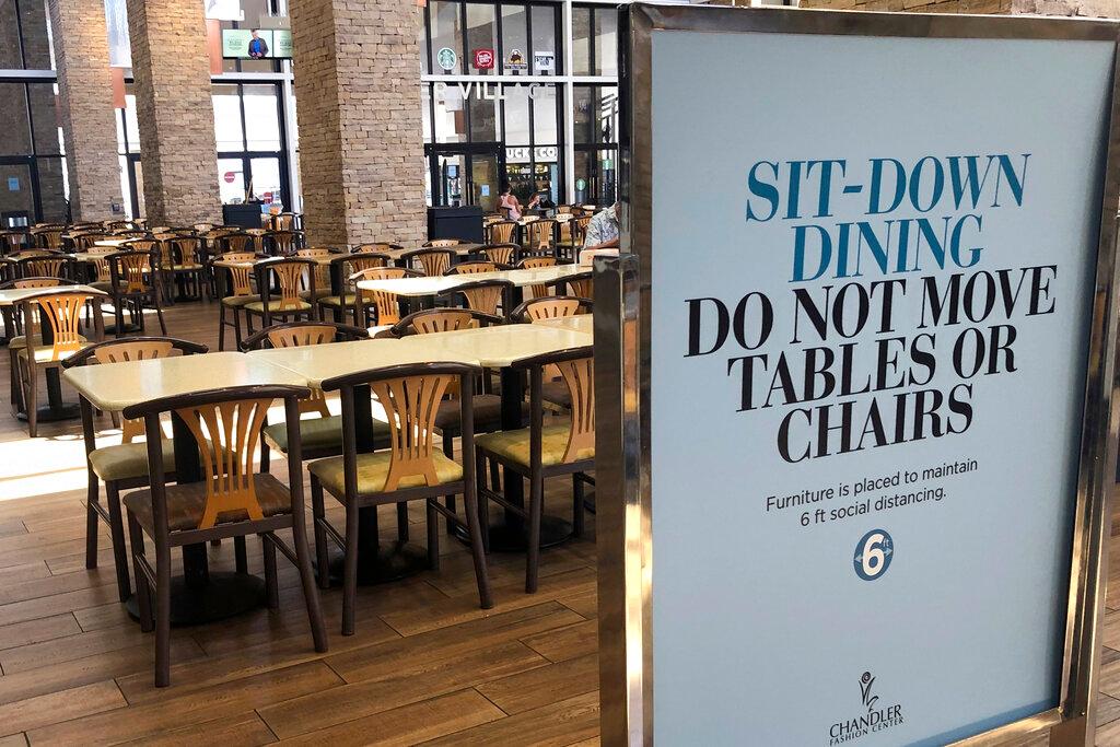 Chandler Fashion Center Mall welcomes back patrons with many social distancing guideline signs