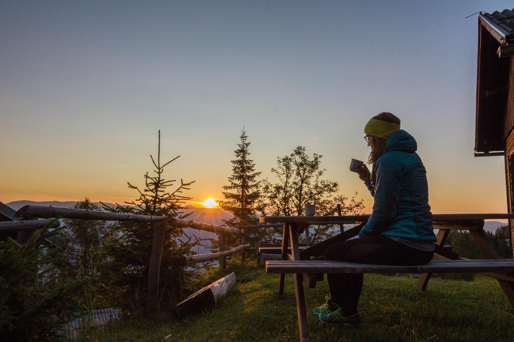 woman drinking coffee on deck