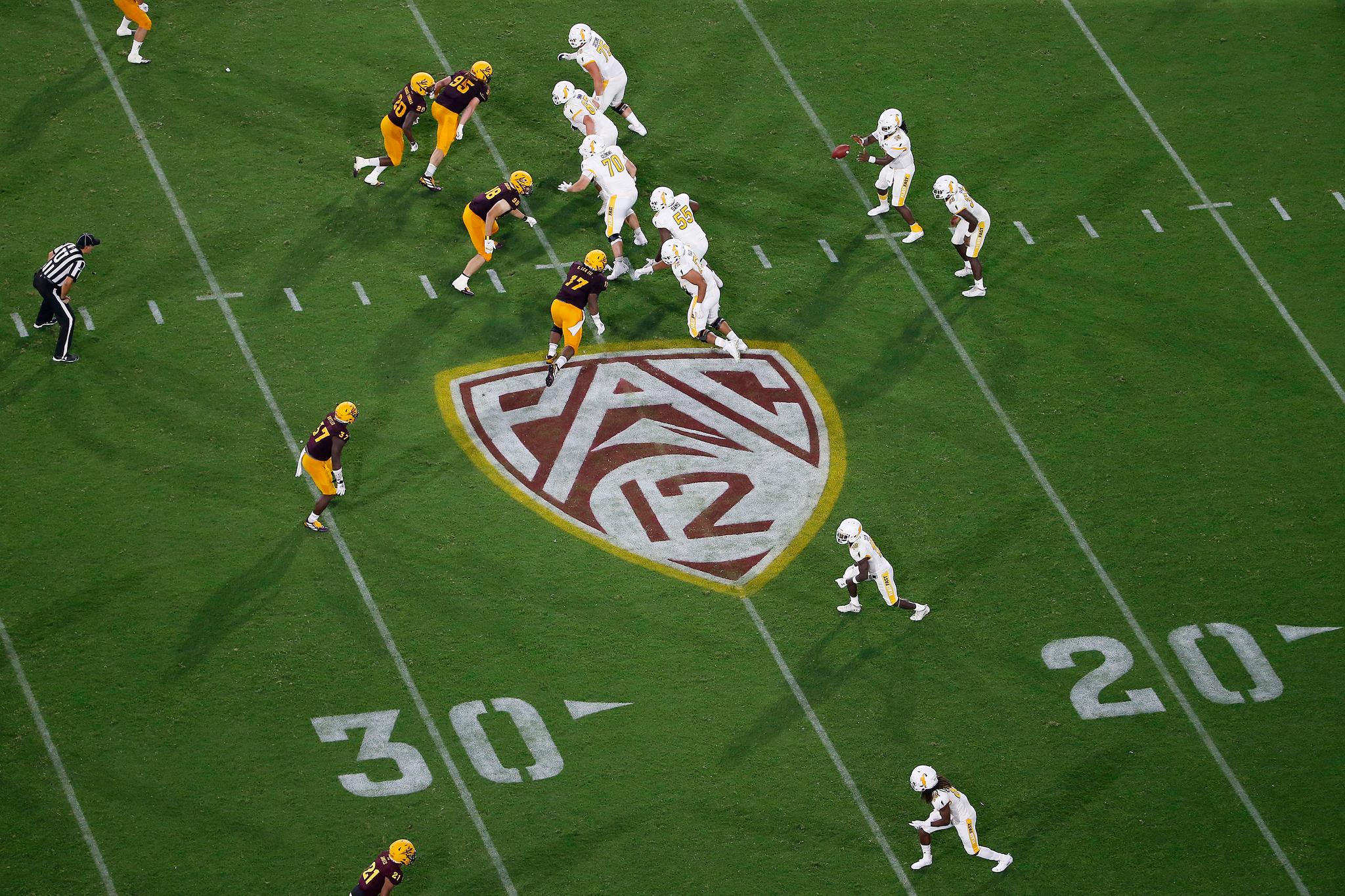 Pac-12 logo football players