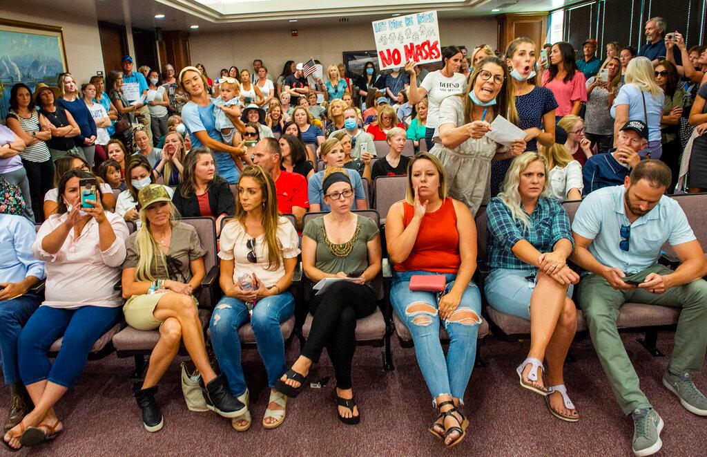 Angry residents react when the Utah County Commission meeting was adjourned before it even started