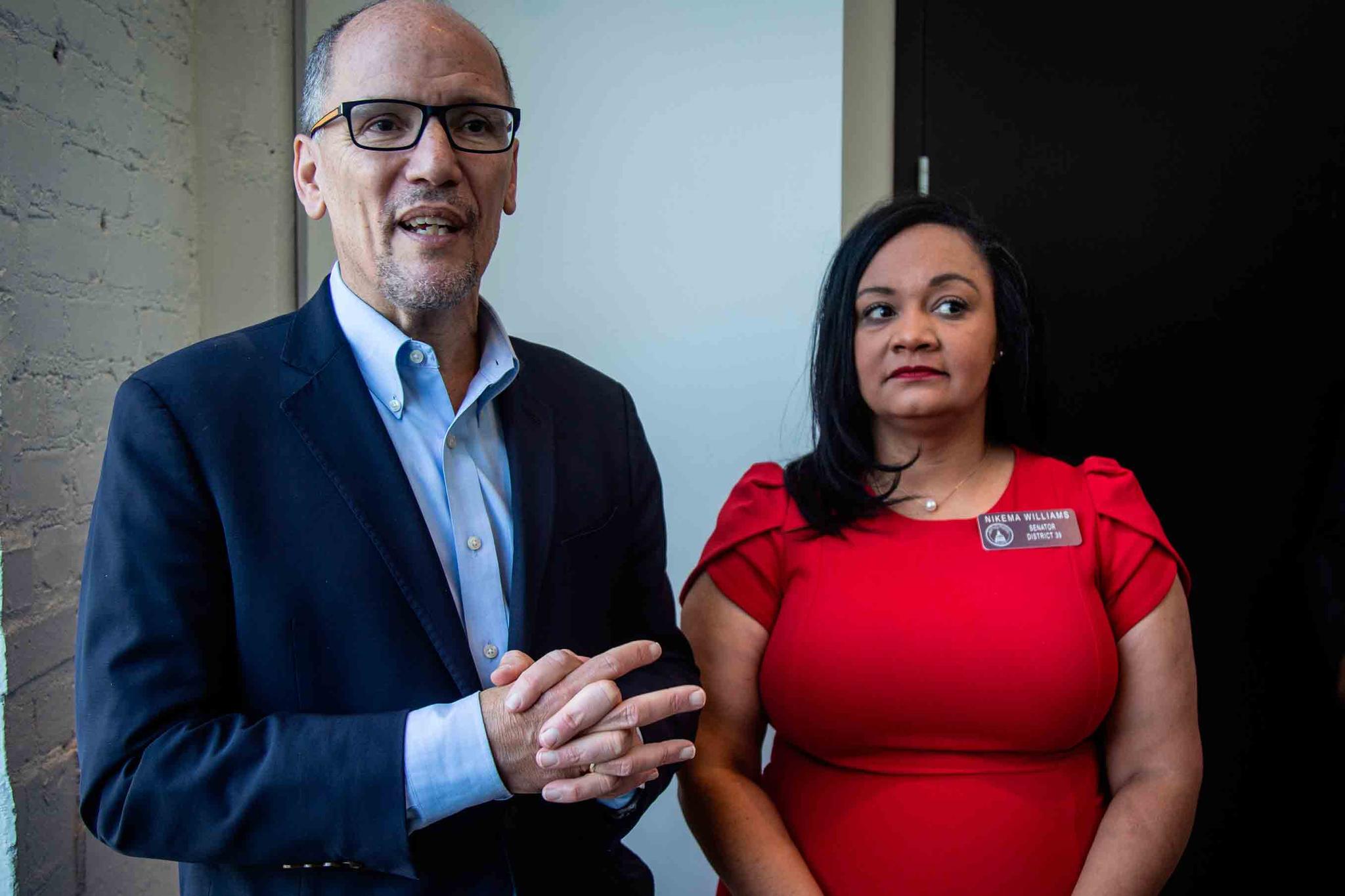 Tom Perez, left, chair of the Democratic National Committee, and Nikema Williams, chair of the Georgia Democratic Party, speak with reporters, in Atlanta.