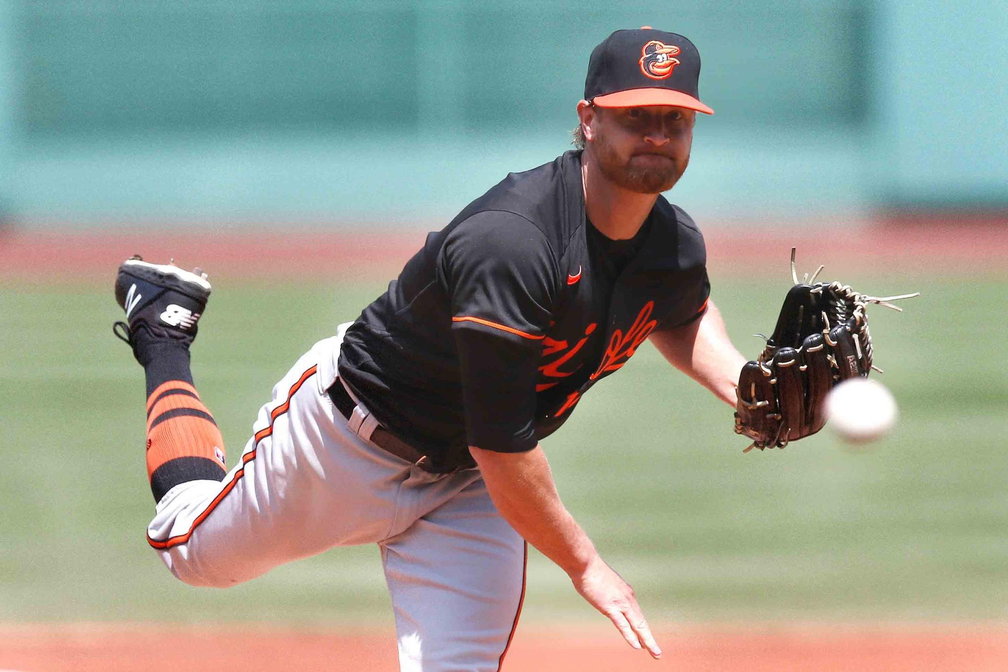 Baltimore Orioles' Alex Cobb pitches against the Boston Red Sox during the first inning of a baseball game, Saturday, July 25, 2020, in Boston.