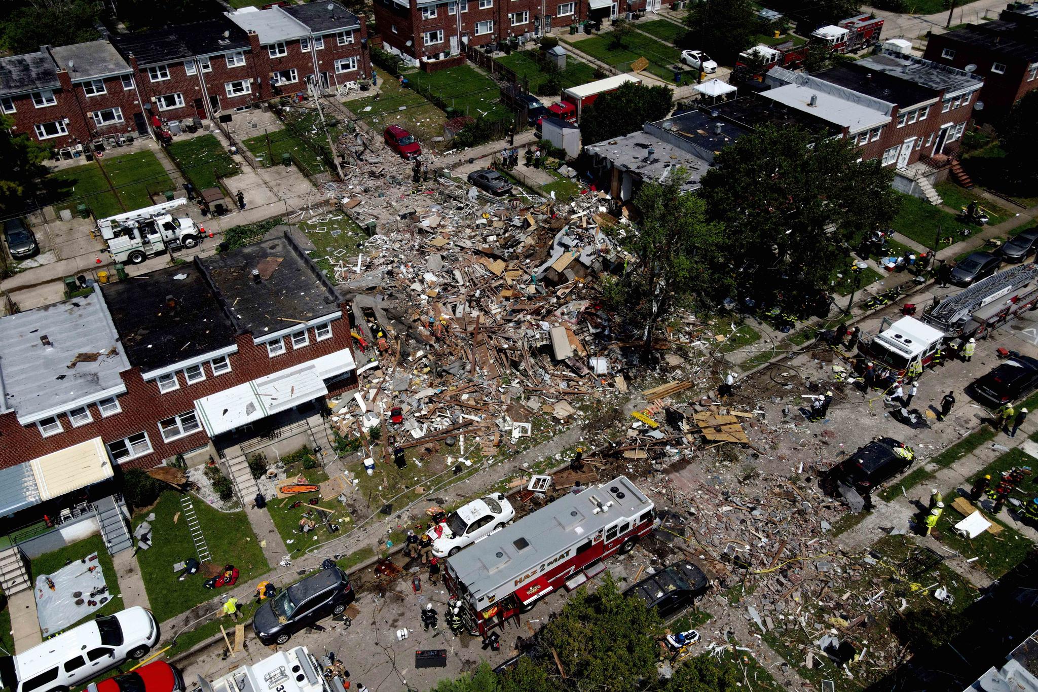Debris and rubble covers the ground in the aftermath of an explosion in Baltimore on Monday, Aug. 10, 2020.