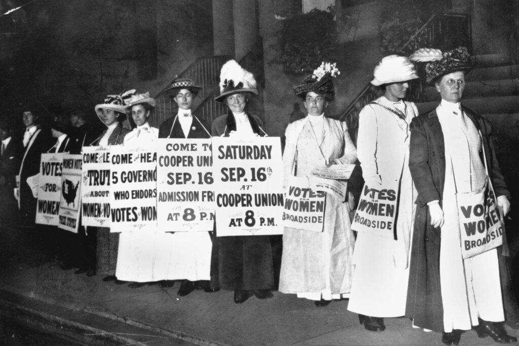 1916 file photo, demonstrators hold a rally for women's suffrage in New York. The Seneca Falls convention in 1848 is widely viewed as the launch of the women's suffrage movement, yet women didn't gain the right to vote until ratification of the 19th Amendment in 1920.