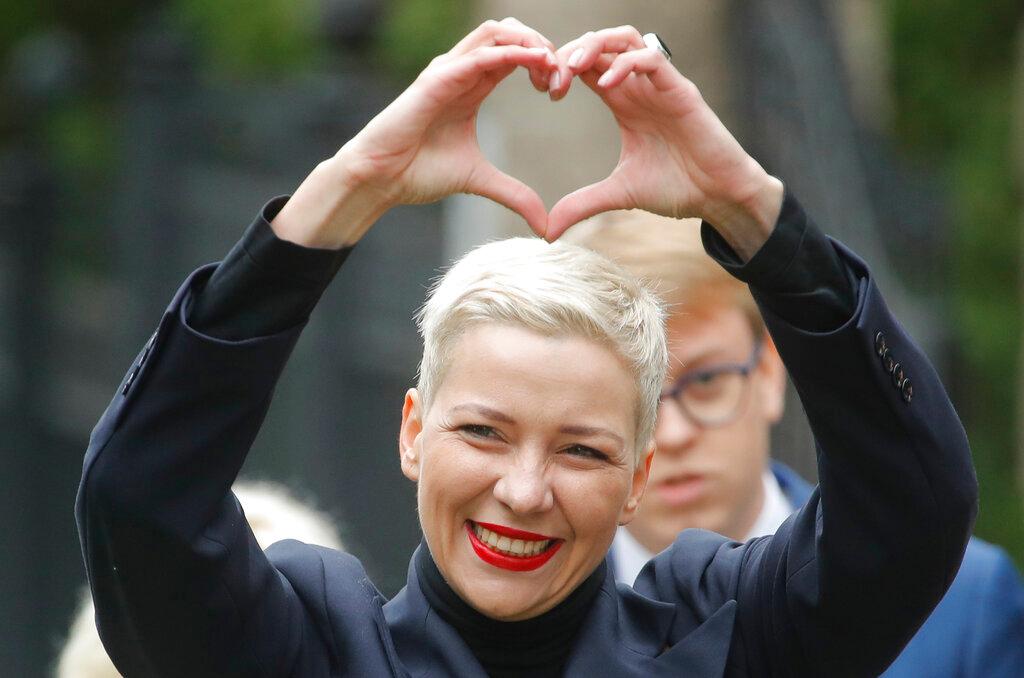Maria Kolesnikova, one of Belarus' opposition leaders, center, gestures, during a rally in Minsk, Belarus.