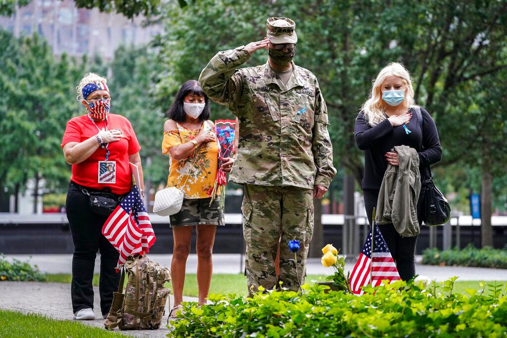 Soldier salutes at September 11 Memorial 