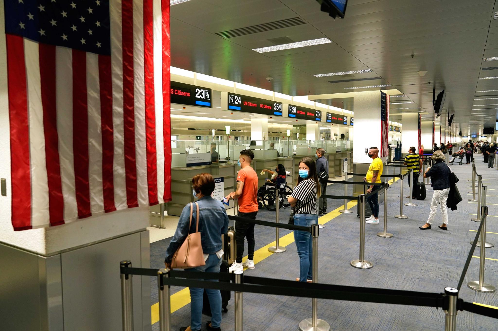 passengers arrive at airport