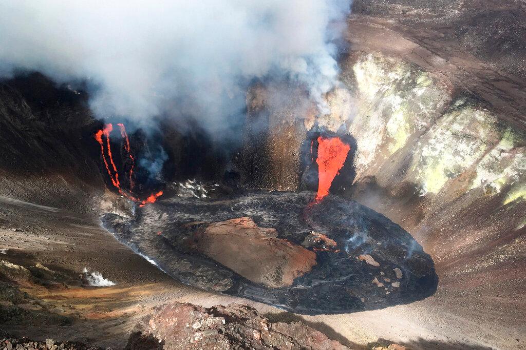 Plume rises near active fissures in the crater of Hawaii's Kilauea volcano