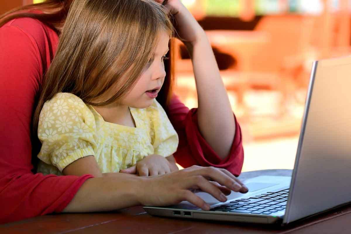 Mom and daughter on computer 