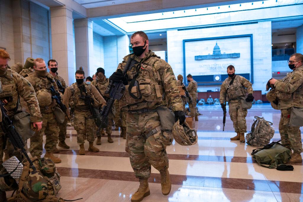 Hundreds of National Guard troops hold inside the Capitol Visitor's Center 