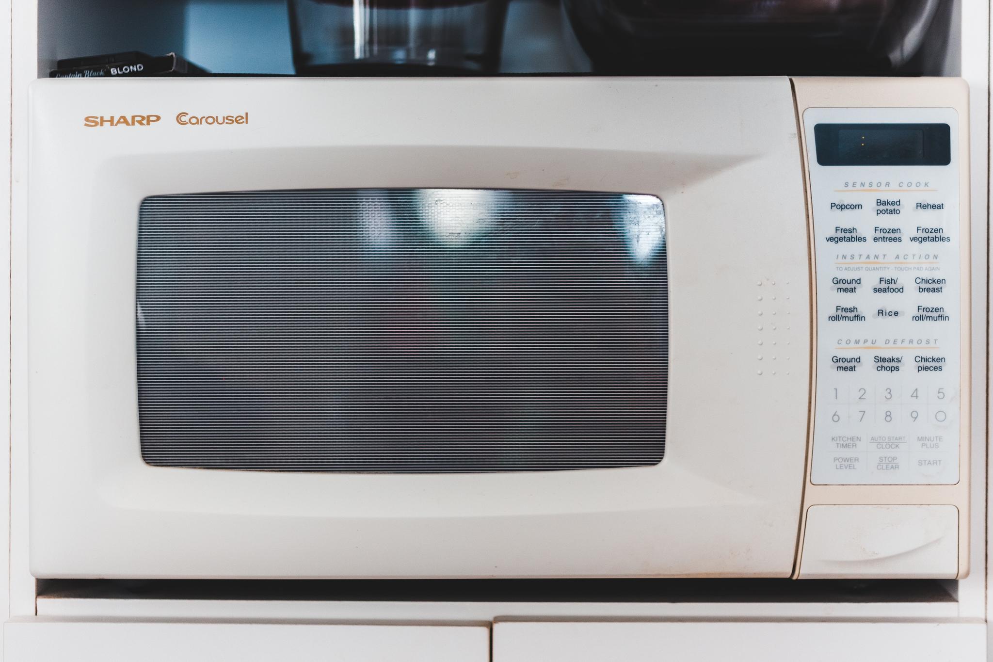 A microwave, an appliance typically used to cook hot pockets