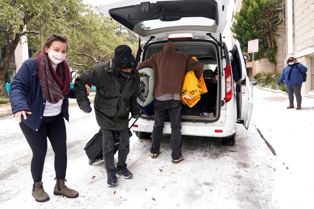  people going to a warming shelter