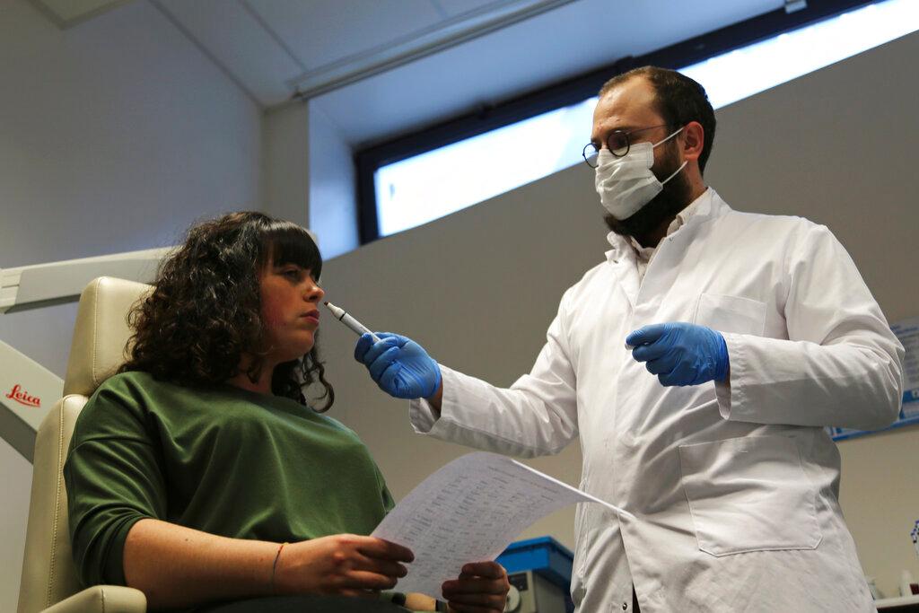 Doctor giving Covid test