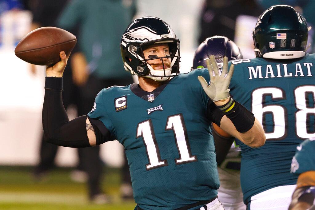 Carson Wentz (11) passes during an NFL football game against the Seattle Seahawks in Philadelphia
