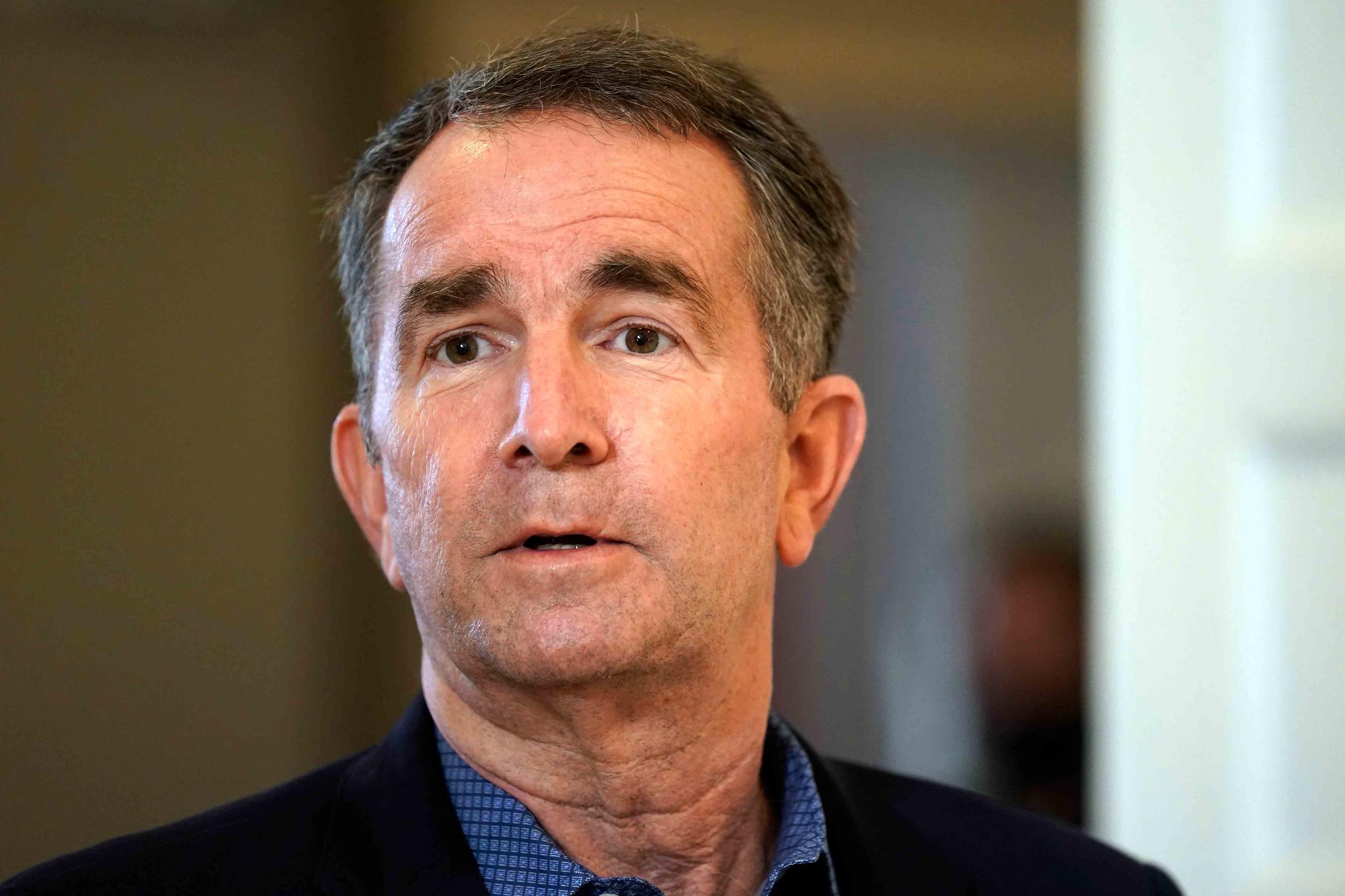 file photo shows Virginia Gov. Ralph Northam at the Governor's Mansion in Richmond, Va.