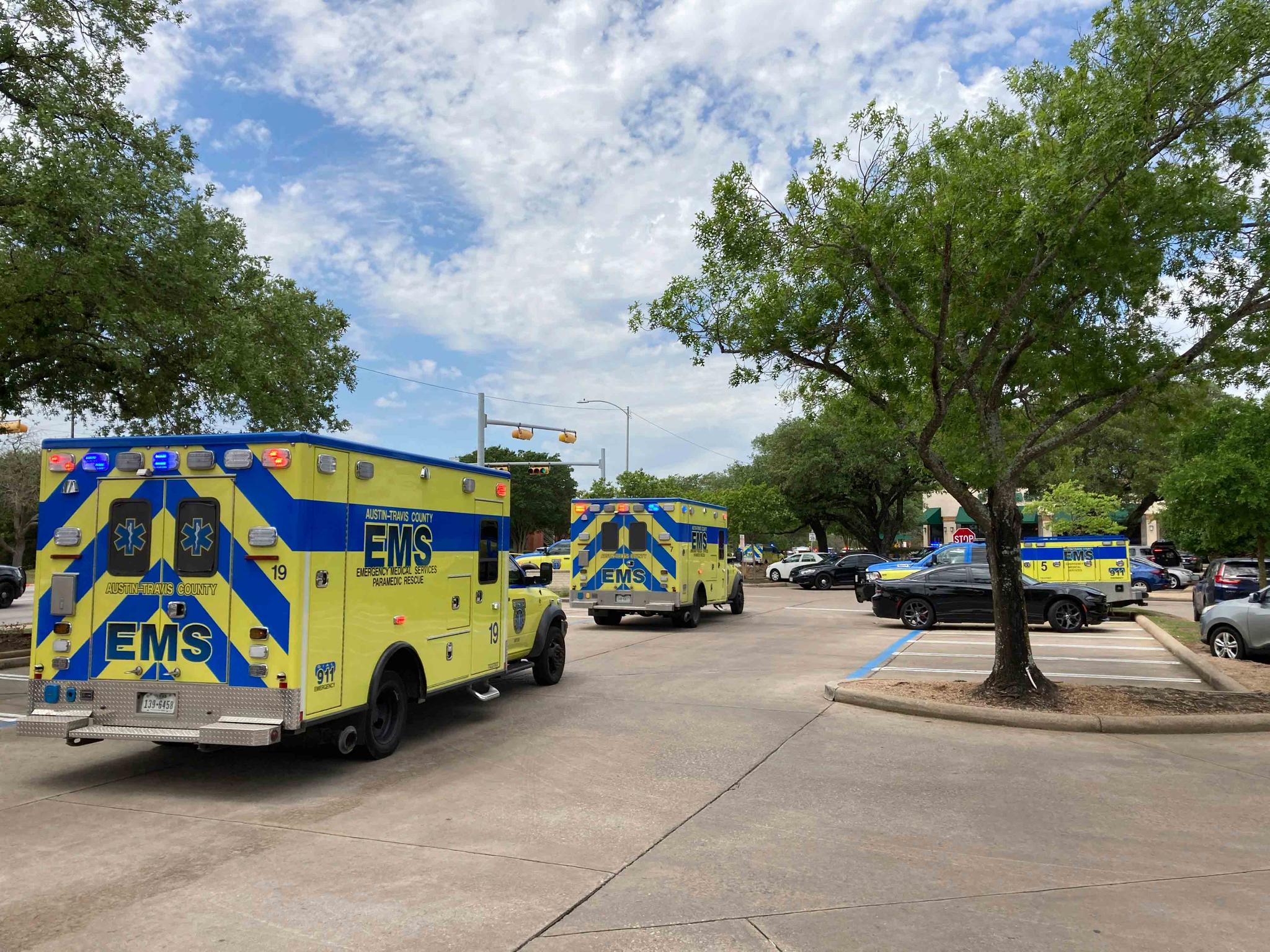 Emergency personnel work at the scene of a fatal shooting, Sunday, April 18, 2021, in Austin, Texas.