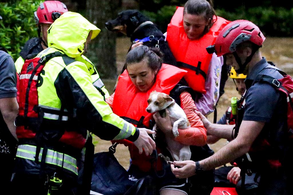 Residents of the Crescent at Lakeshore apartment complex are rescued by Homewood Fire and Rescue