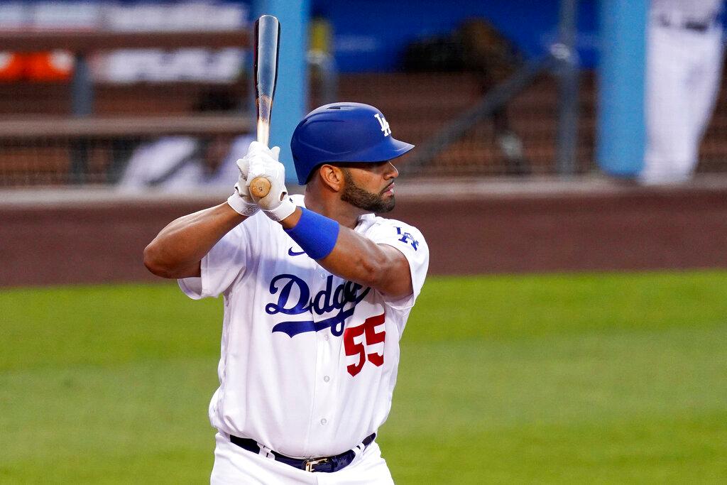 Los Angeles Dodgers' Albert Pujols bats during the first inning of a baseball game against the Arizona Diamondbacks 