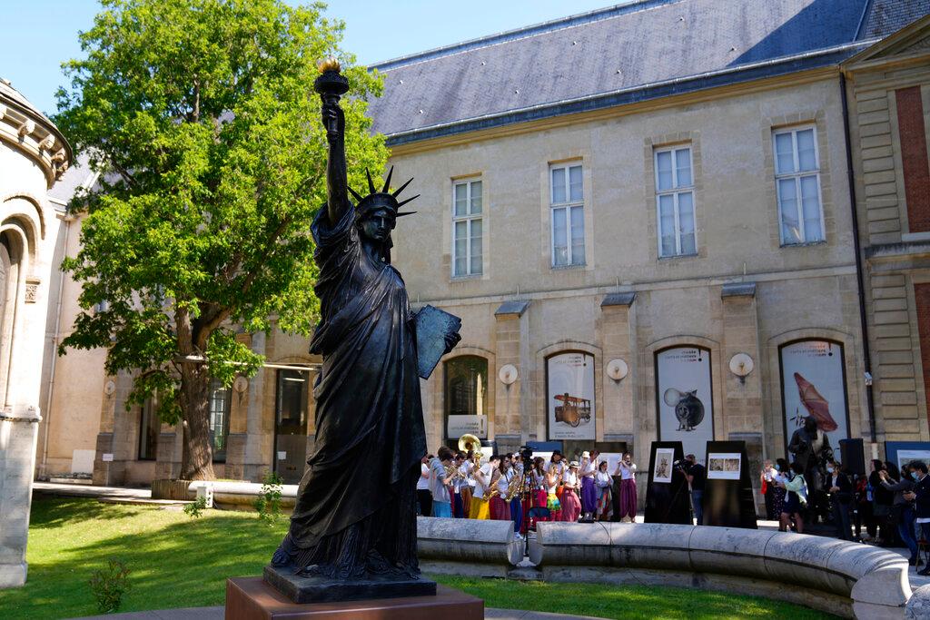 The "Liberty Enlightening the World" by Frederic Auguste Bartholdi, a mini-replica of the French-designed Statue of Liberty
